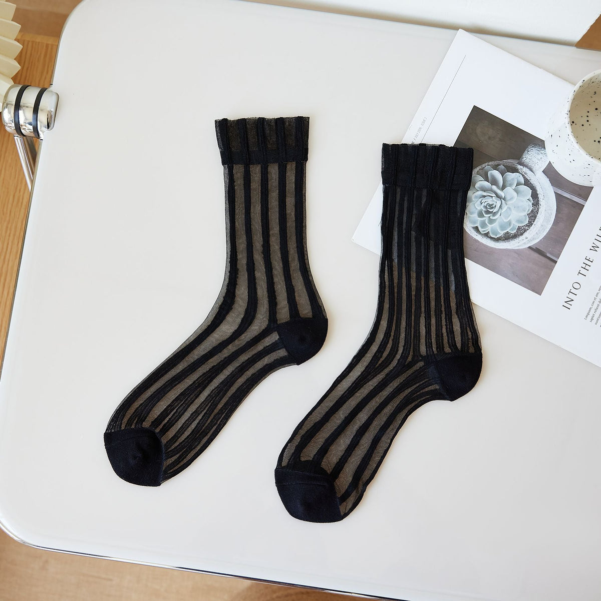 Women's thin mid-calf solid-color lace-up socks, close-up product view