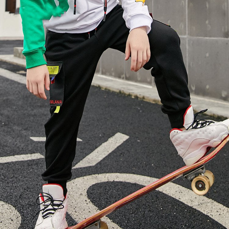 New knitted boy pants in a simple design, shown against a plain background