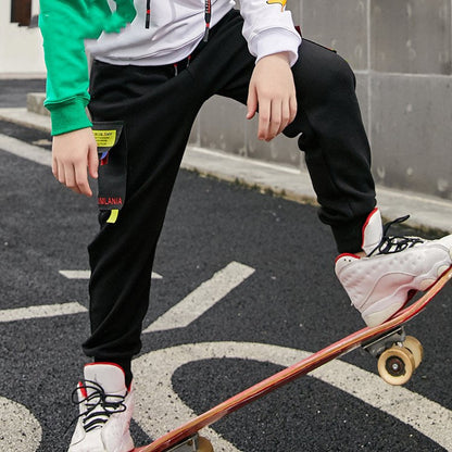 New knitted boy pants in a simple design, shown against a plain background