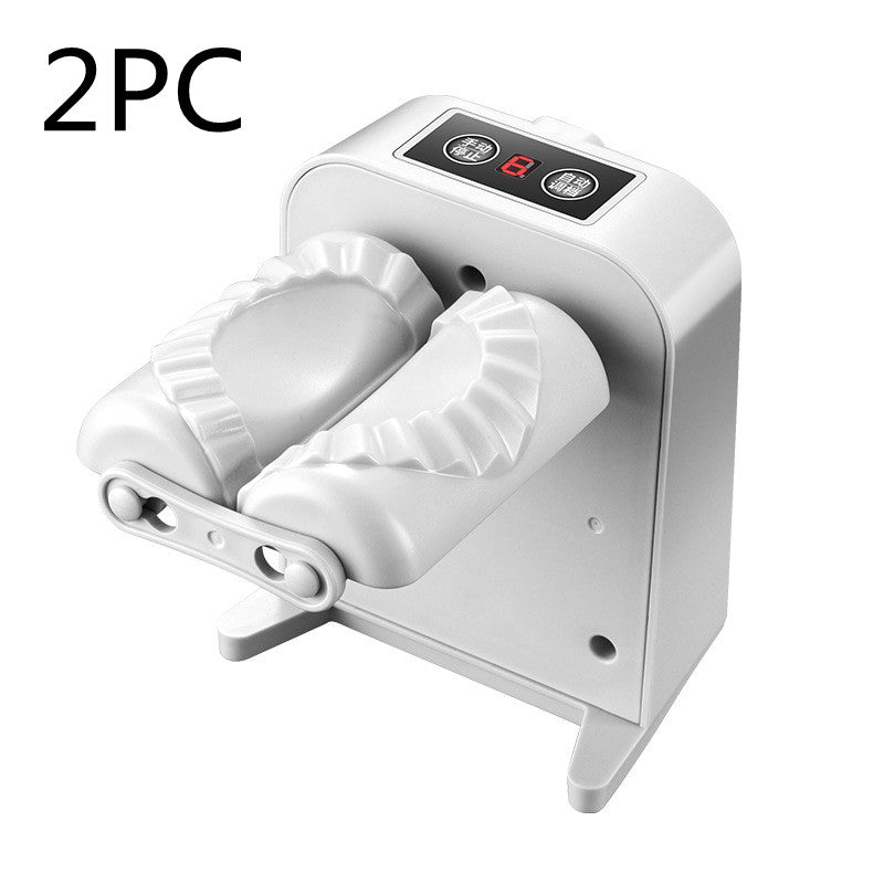 Automatic electric dumpling maker machine for kitchen use, compact household appliance with dumpling molds