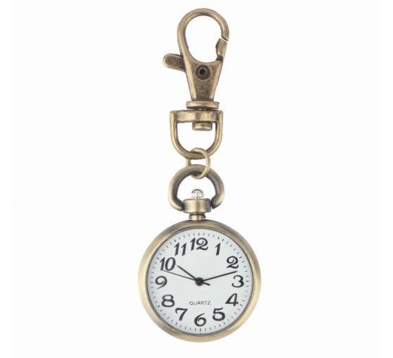 Vintage pocket watch with classic design and visible hands, displayed against a clean background