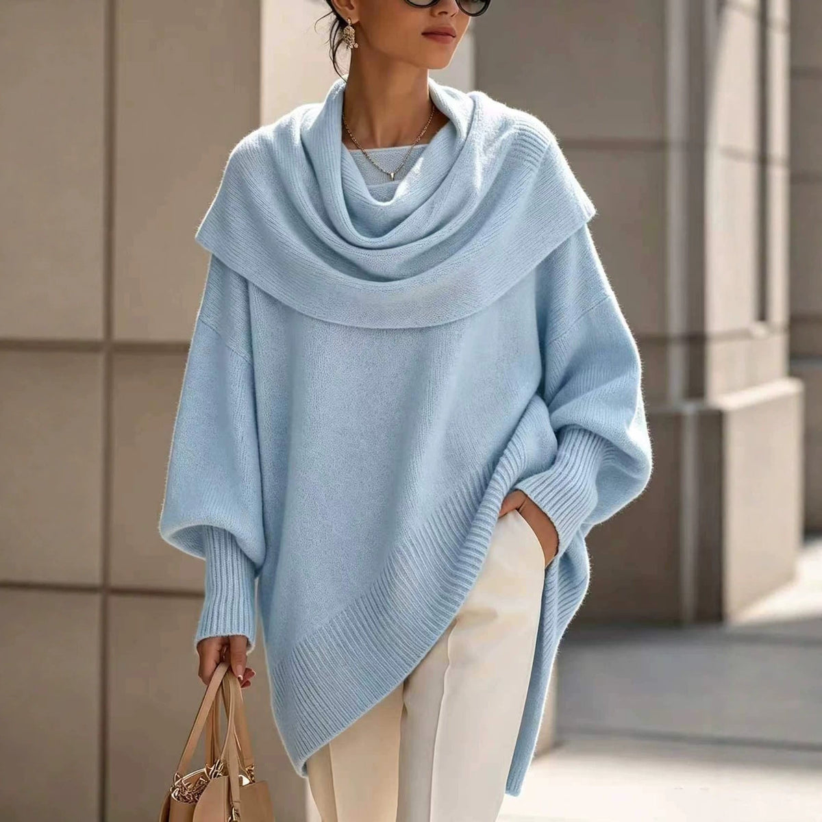 Loose batwing-sleeve asymmetrical pullover top in a relaxed silhouette
