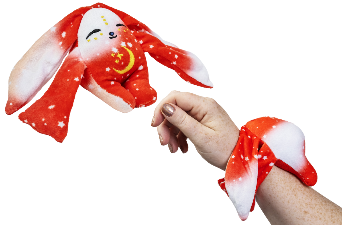 Moon Pals Rover Mini Wrist Hugger plush toy, soft and cuddly wrist accessory with a cute animal design.