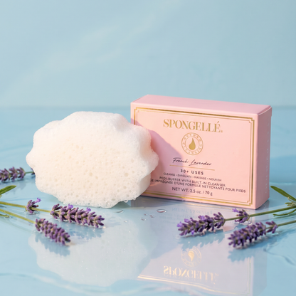 Spongellé French Lavender Pedi Buffer with textured surface for gentle foot exfoliation and soothing lavender scent.