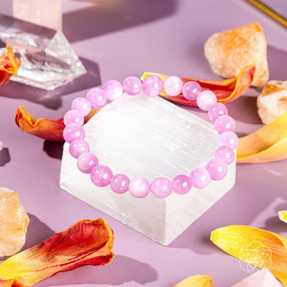 Pink Kunzite bracelet from Conscious Items featuring a delicate heart reset design with polished pink gemstones.