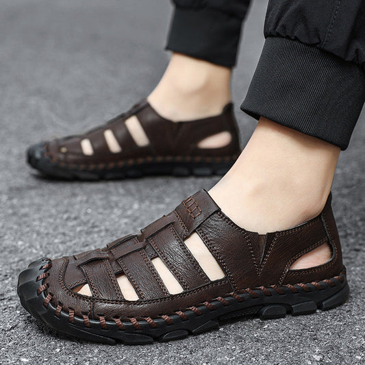 Plus-size men's hollow-out sandals with sewn-in sole, shown in black synthetic leather