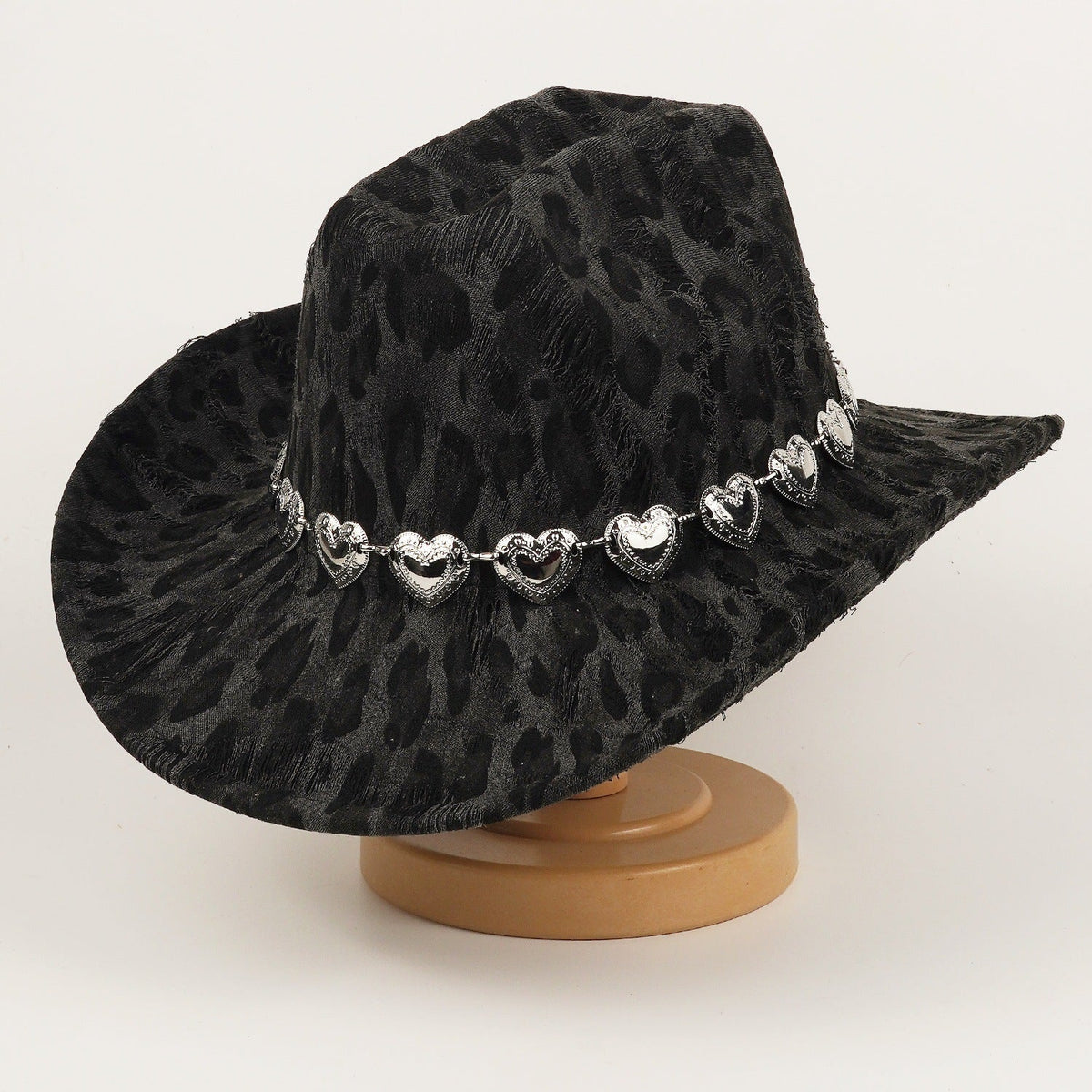 Unisex black leopard-print denim hat with a bold spotted pattern and structured brim