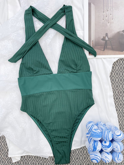 Patchwork one-piece swimsuit bikini with colorful contrasting panels and a flattering fitted design