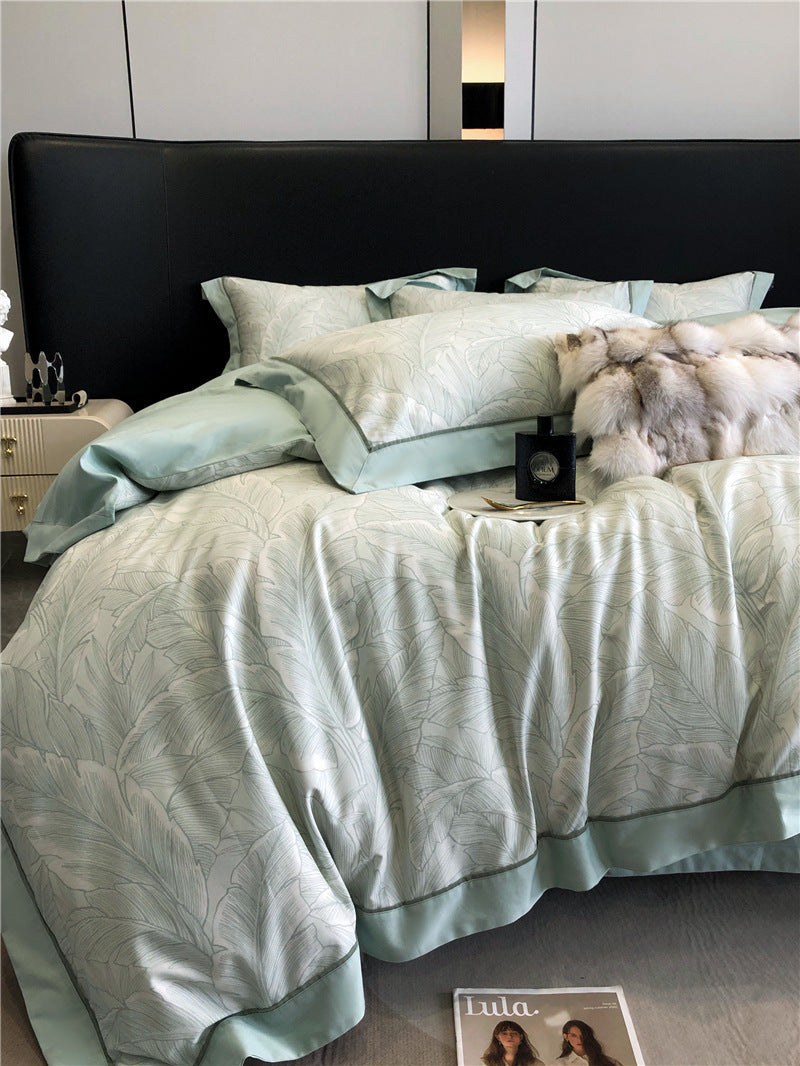 Long-staple cotton printed four-piece bedding set with matching duvet cover, fitted sheet, and pillowcases