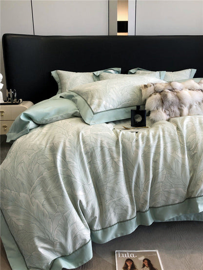 Long-staple cotton printed four-piece bedding set with matching duvet cover, fitted sheet, and pillowcases