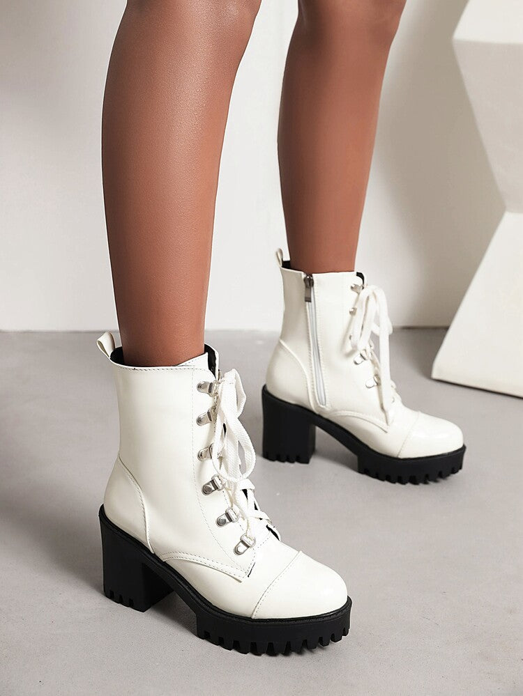 Patent leather chunky-heel riding boots with thick sole front by My Store