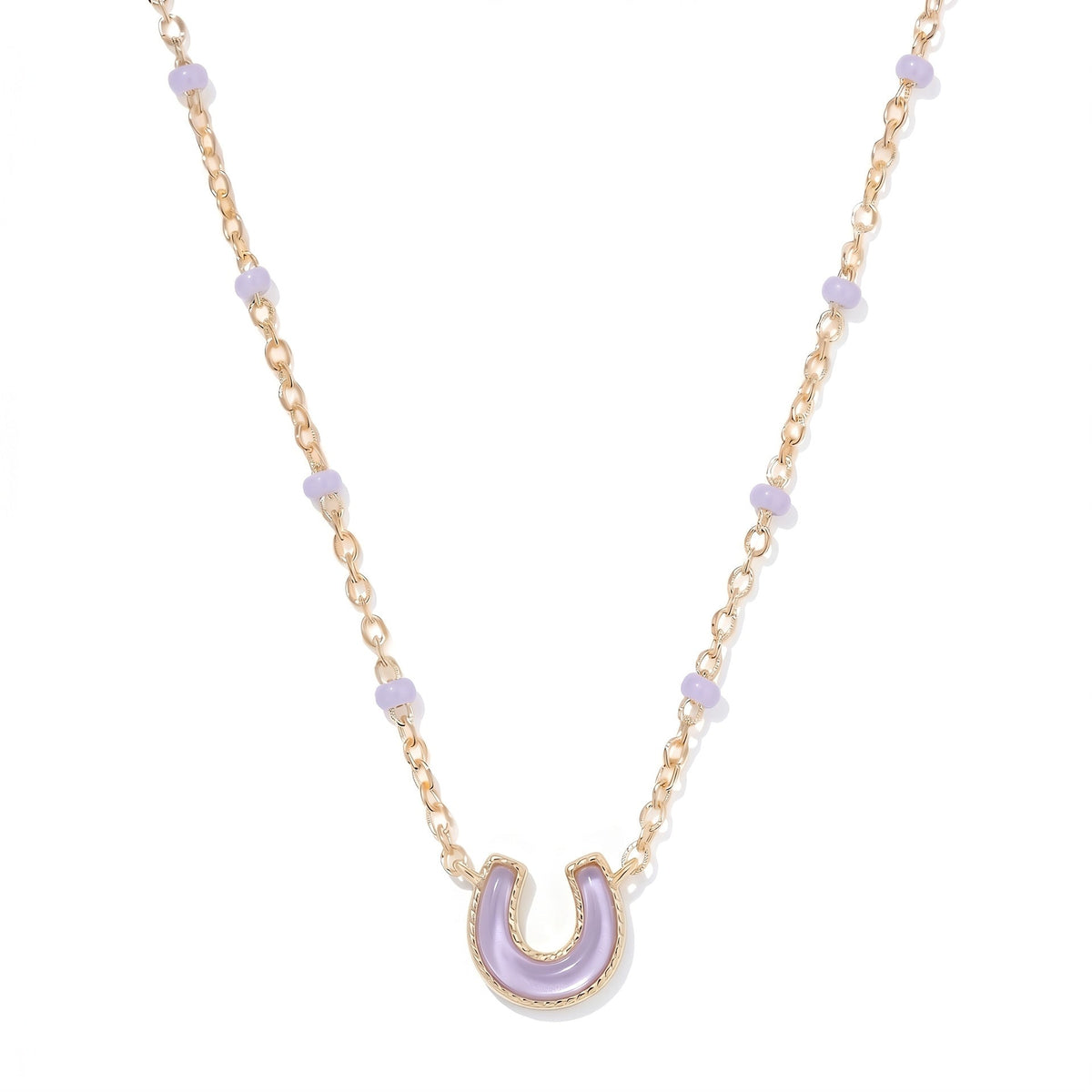 Geometric irregular cross and heart necklace pendant close-up