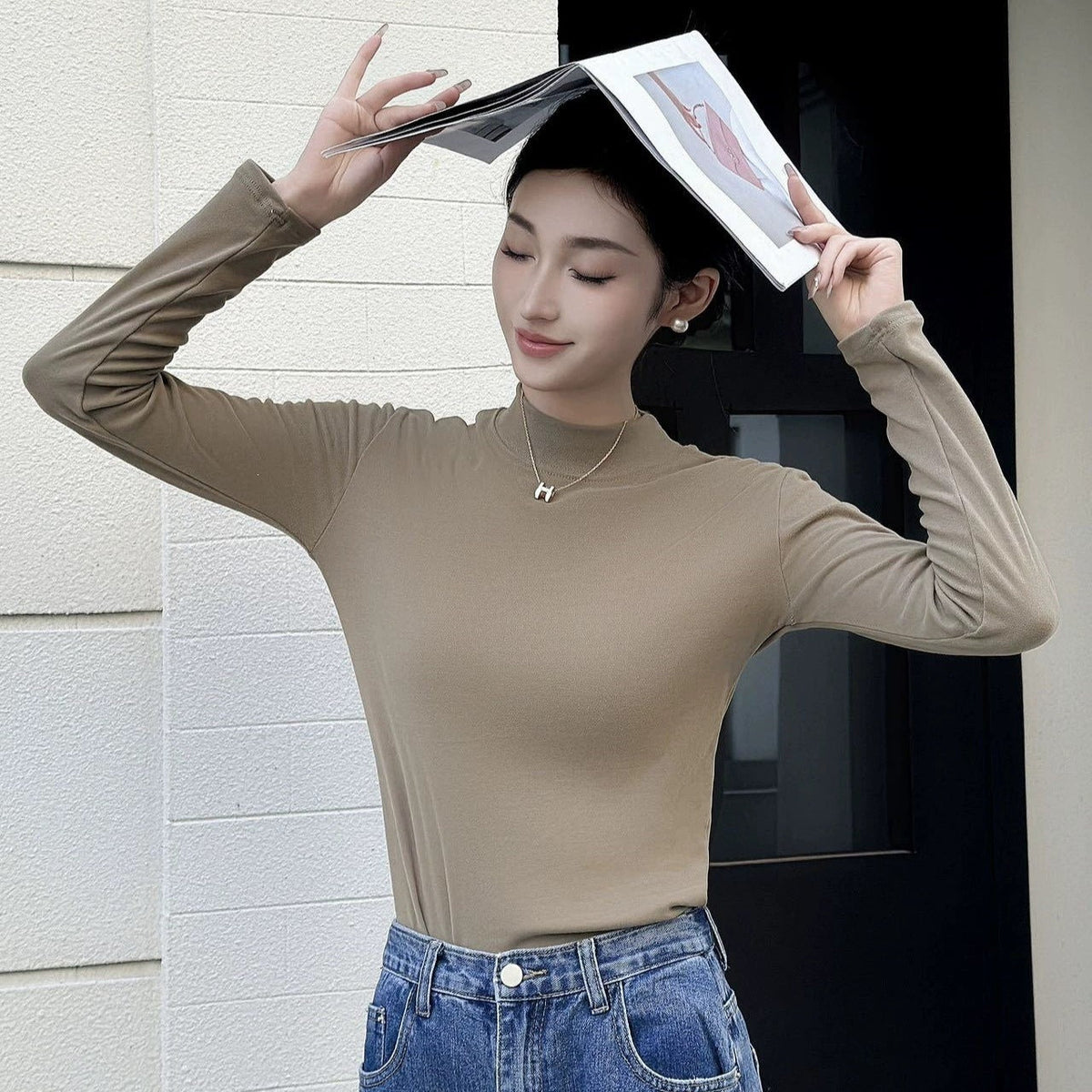 Double-sided brushed knit long-sleeve top in a versatile design, front view