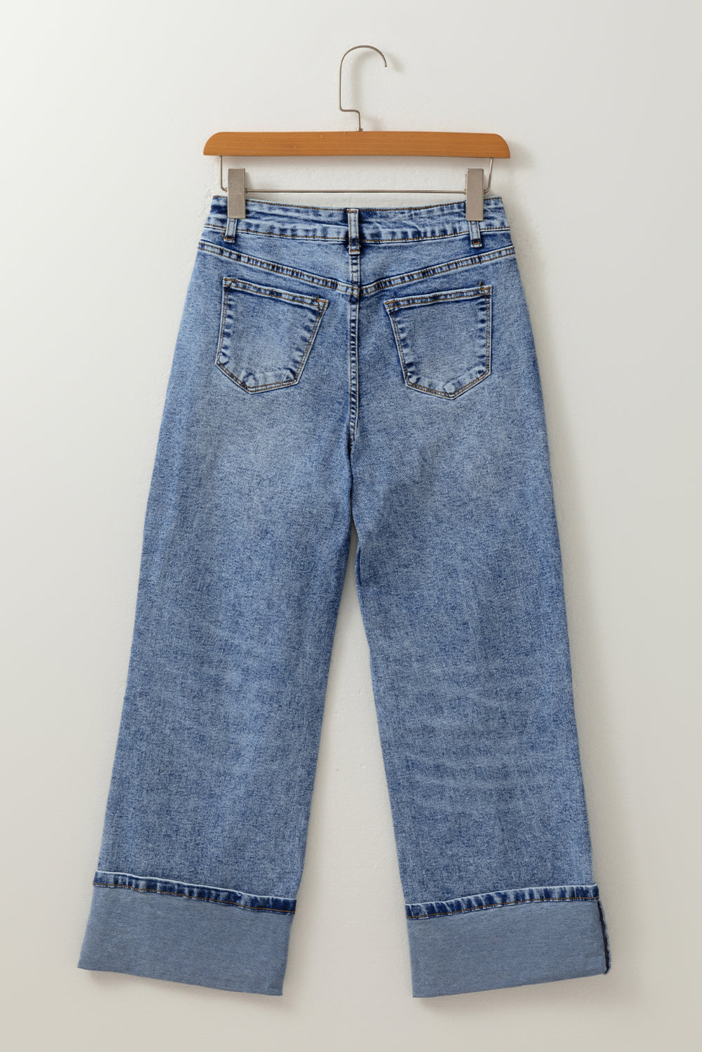 Light blue Aria Straight High Waist Jeans by Threaded Pear, showing the fit and classic design on a model.