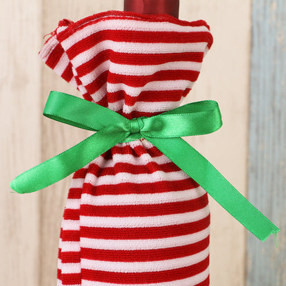 Striped Christmas wine bottle decorations set with festive red, green, and white holiday patterns