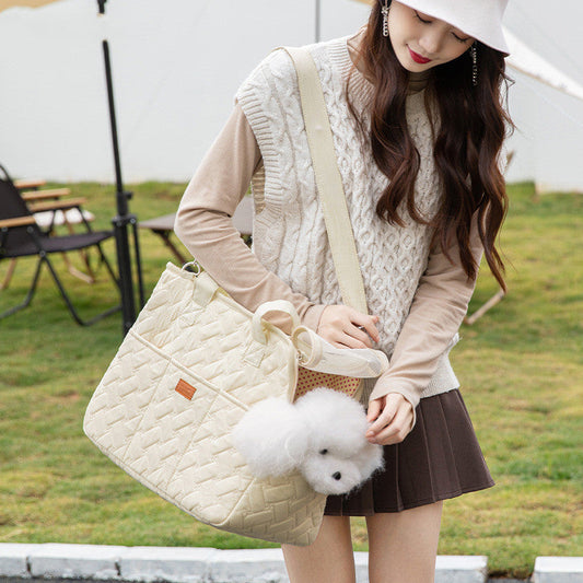 Portable high-capacity pet handbag with ventilation for carrying dogs and cats