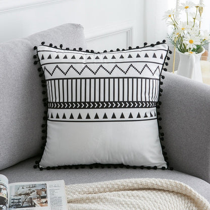 Bohemian National throw pillow with colorful woven pattern and decorative tassels