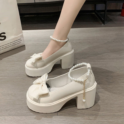 Pearl bow high-heeled leather shoes with elegant pearl detailing and pointed toes