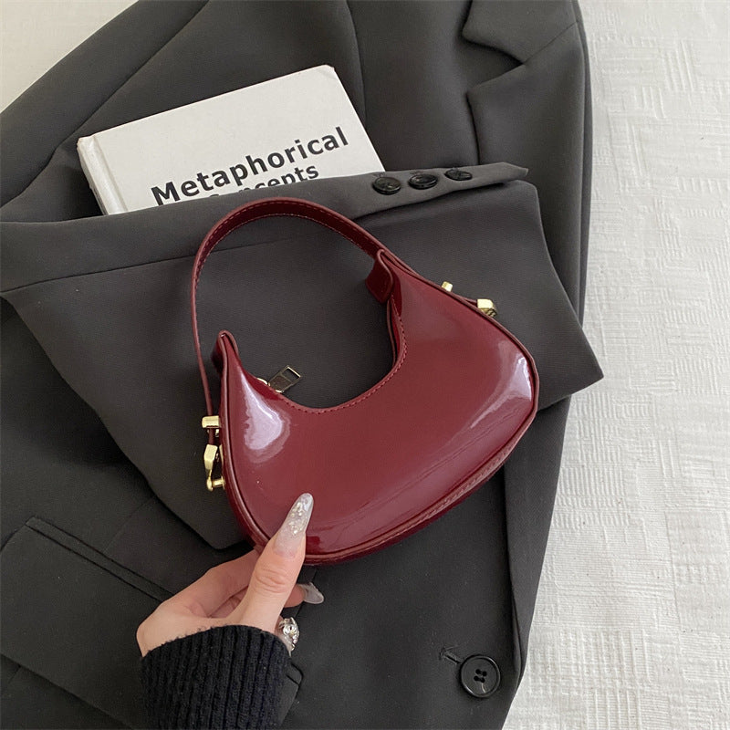 French-style niche luxury handbag in a structured silhouette with refined detailing