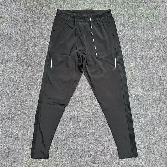 Sports training leggings with long spliced panels in quick-drying fabric for outdoor activities
