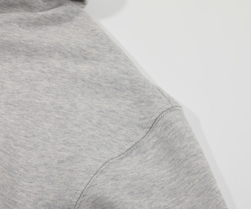 Relaxed stylish versatile zip-up cardigan top in a casual knit design, front view