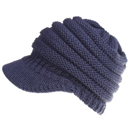 Women’s soft knitted ponytail beanie, warm autumn winter hat with opening for ponytail and skullcap design