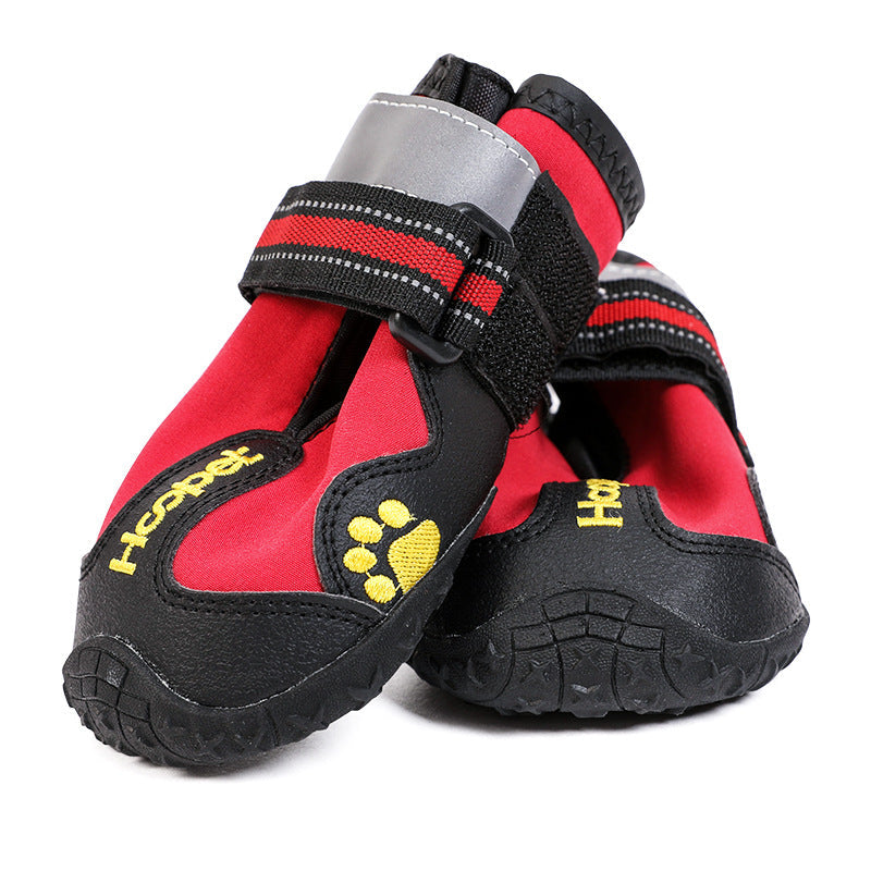 Reflective waterproof dog shoes with secure straps, designed for outdoor walks in wet conditions