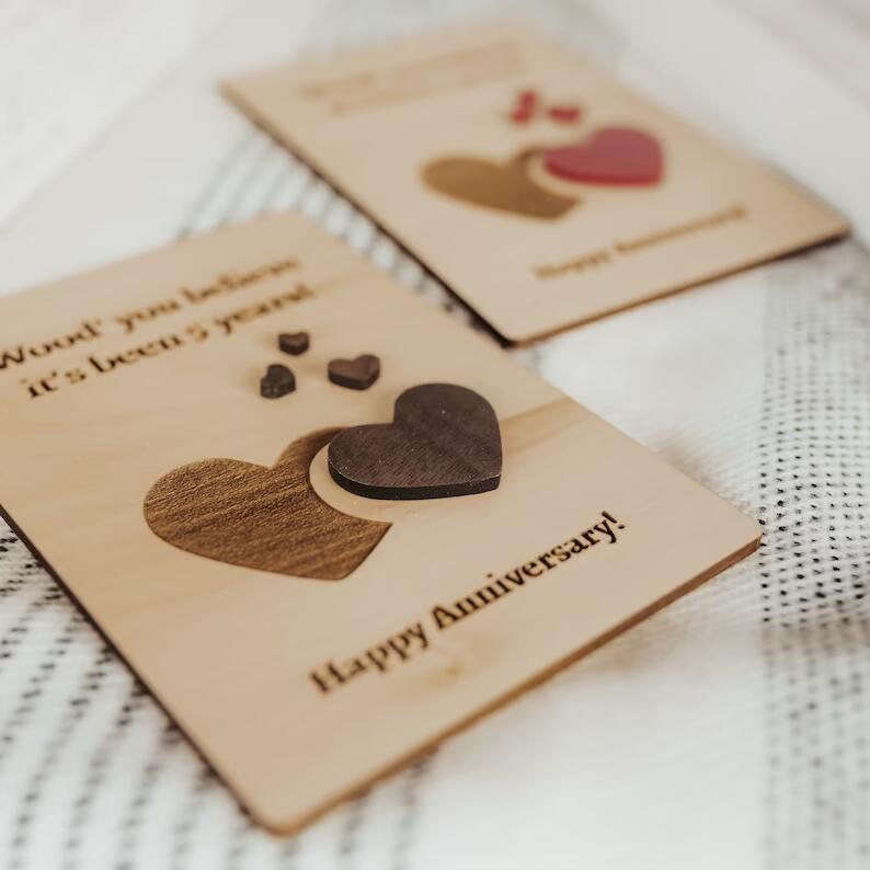 Wooden carving wedding anniversary invitation card with intricate engraved design