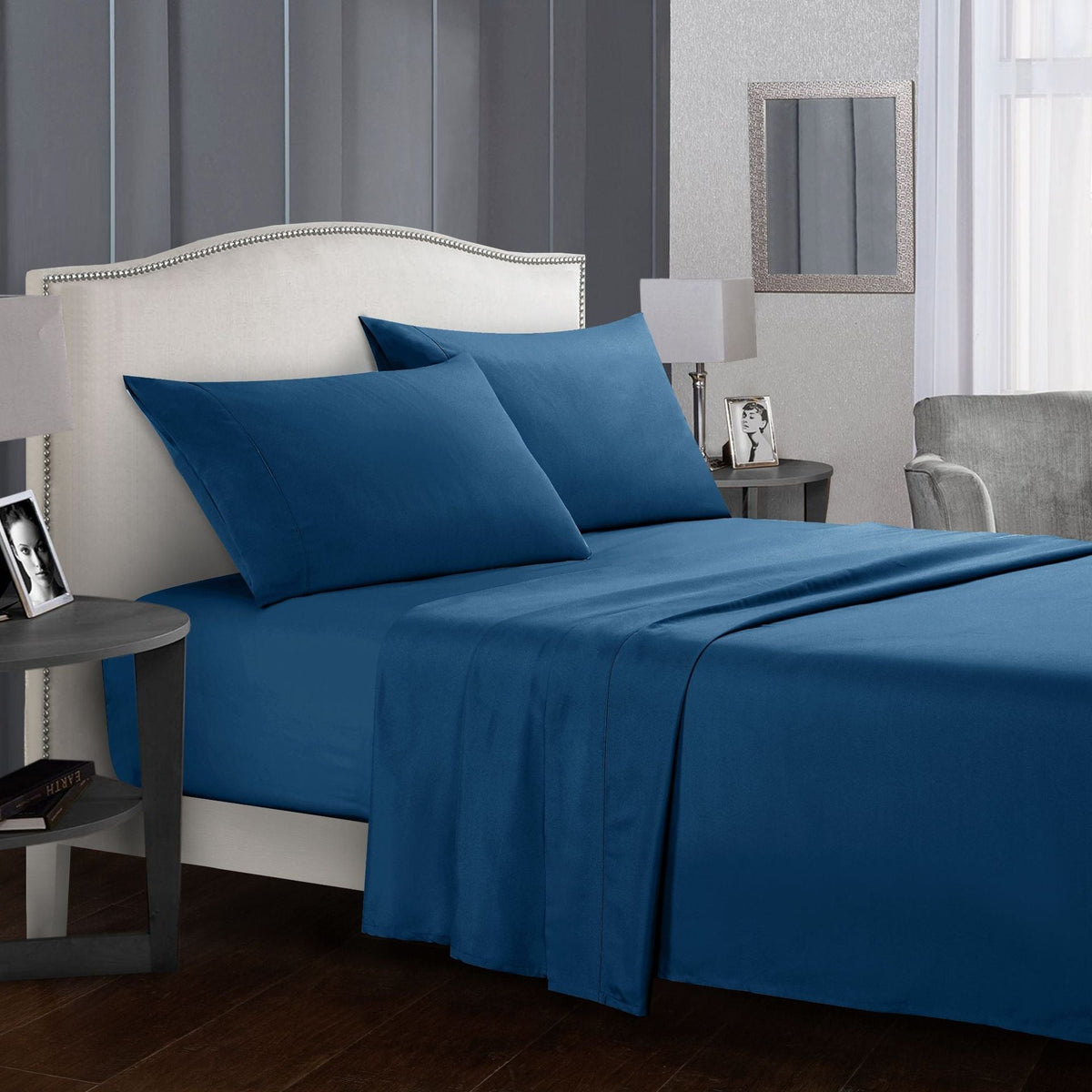 Four-piece bed sheet set by My Store, featuring coordinated sheets and pillowcases in a clean, classic design