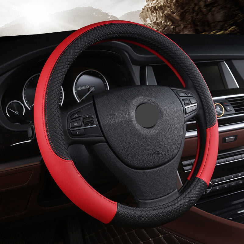 Universal leather car steering wheel cover in black, showing textured grip and stitched edge detail