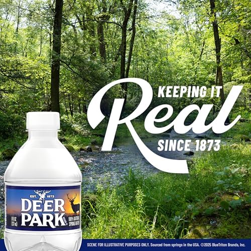 Sixteen 8-ounce Deer Park natural spring bottled water mini bottles in a 12-pack, clear plastic bottles with blue caps.