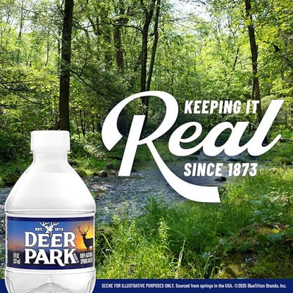 Sixteen 8-ounce Deer Park natural spring bottled water mini bottles in a 12-pack, clear plastic bottles with blue caps.