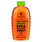 Nate's Organic Honey in a 16oz squeeze bottle, golden honey dripping from the nozzle, natural and pure honey product.