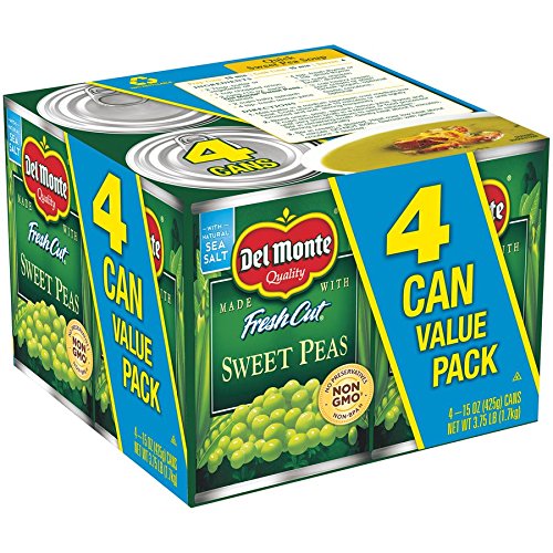 Canned Del Monte sweet peas in 15-ounce cans, fresh cut and bright green, stacked in a pack of four.