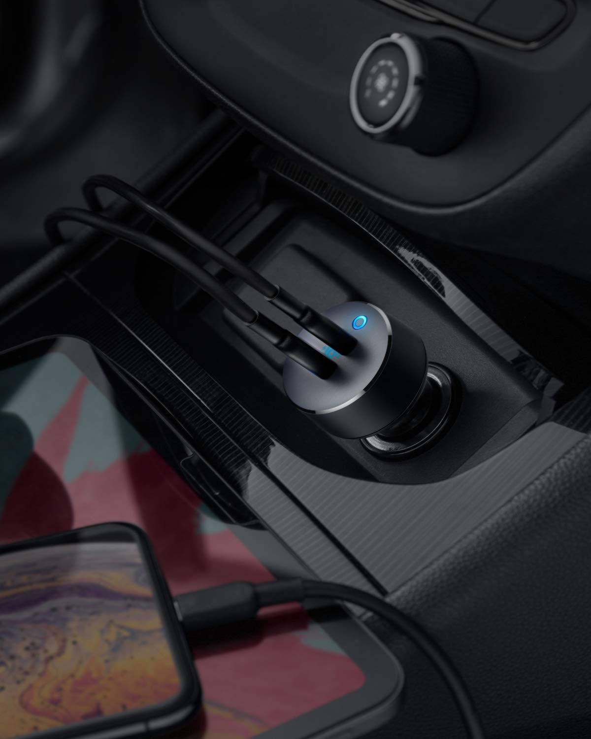 Anker PowerDrive III Duo USB-C car charger with two charging ports and compact design for fast device charging in vehicles.