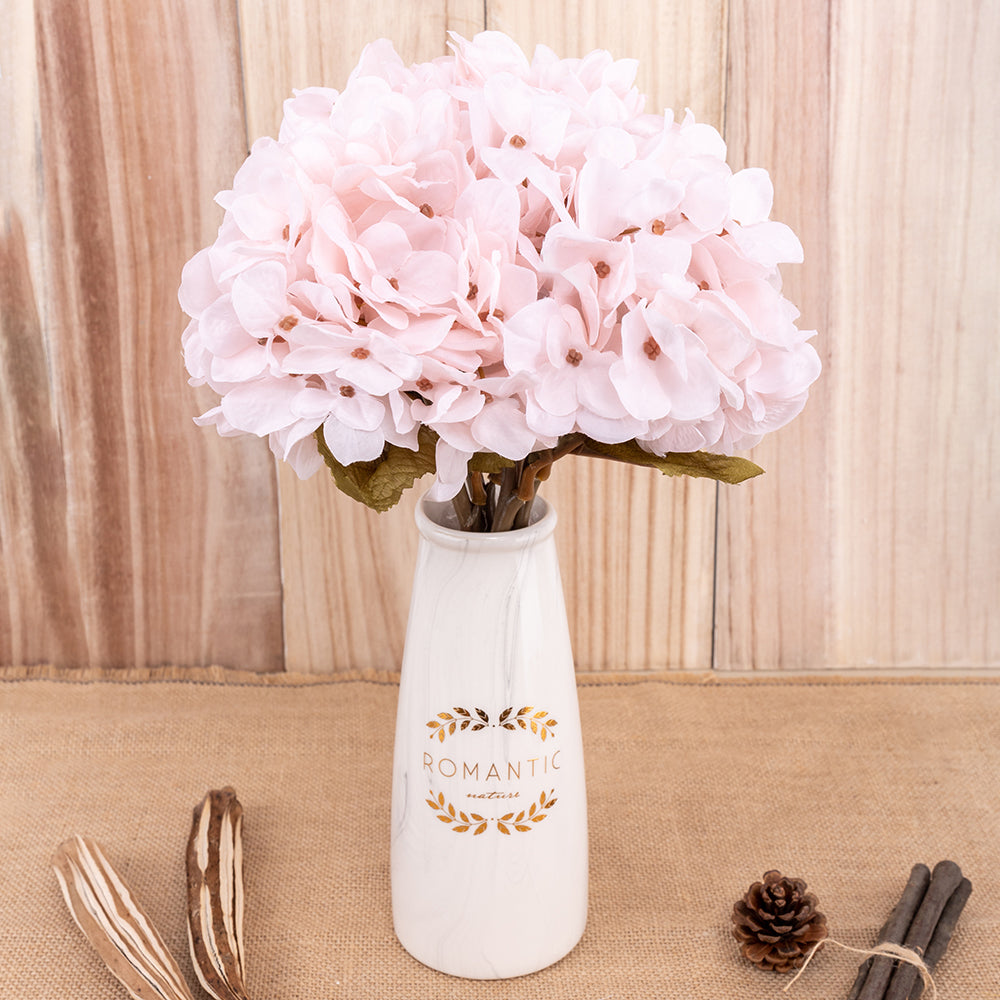 Artificial hydrangea flower branch in autumn colors for home and wedding decor