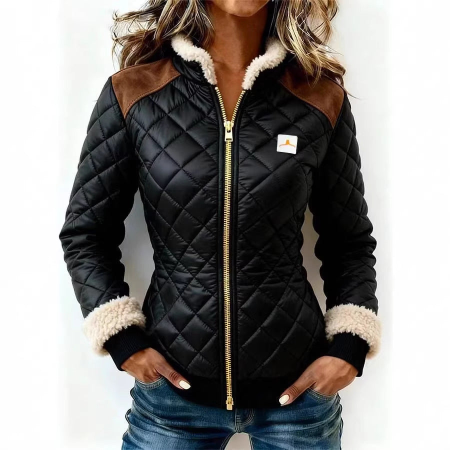 Women's quilted jacket with fur trim and zipper closure, shown from the front