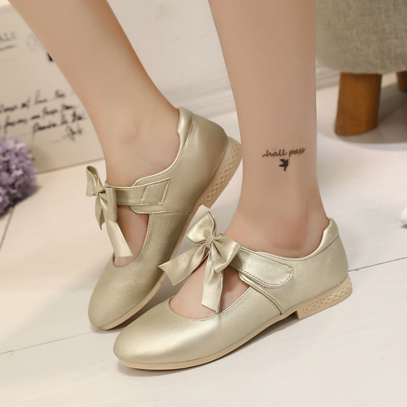 White leather girls’ princess shoes with bowknot detail and rounded toe