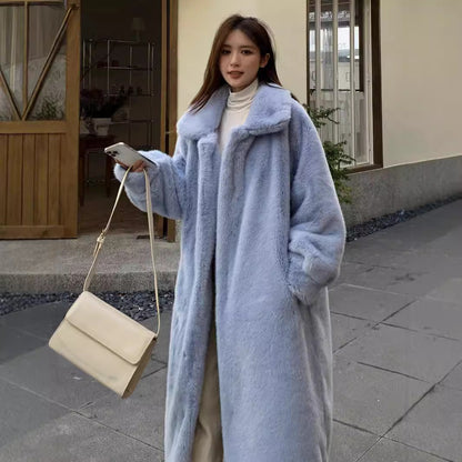 Women’s winter extended leather fur coat in a fashionable long design