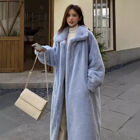 Women’s winter extended leather fur coat in a fashionable long design