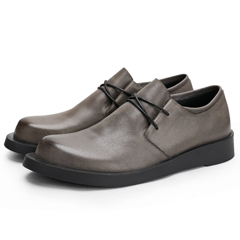 Men's breathable casual leather shoes in a classic design, shown from the side