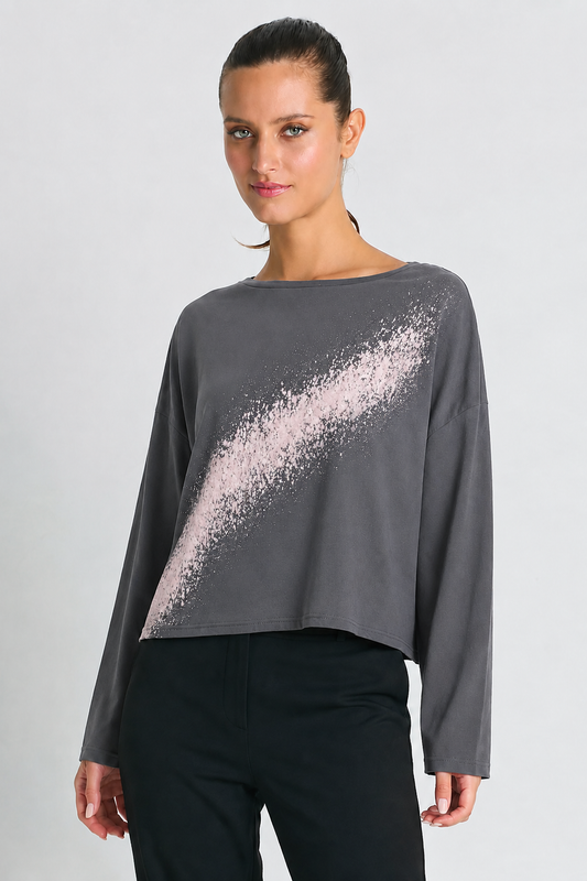 Model wearing PLANET by Lauren G Pima Cotton Mini Bleached Lava T-Shirt, a boxy luxury T-shirt in vibrant lava color.
