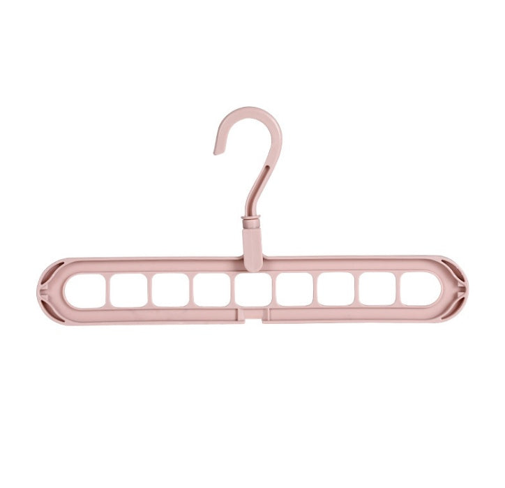 Plastic clothes hanger with storage hook, displayed in a simple design