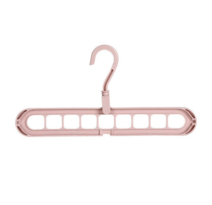 Plastic clothes hanger with storage hook, displayed in a simple design