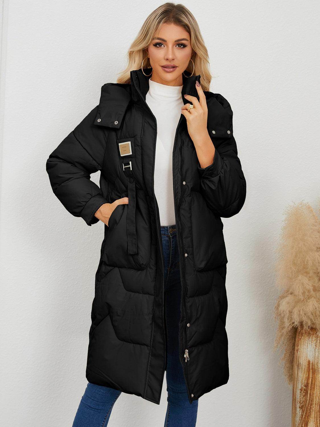Long sleeve longline hooded winter coat for women by Trendsi, featuring a cozy design and a stylish hooded silhouette.