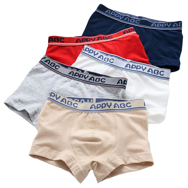 Children's five-pack boxer underwear by ETX, shown in assorted colors and patterns
