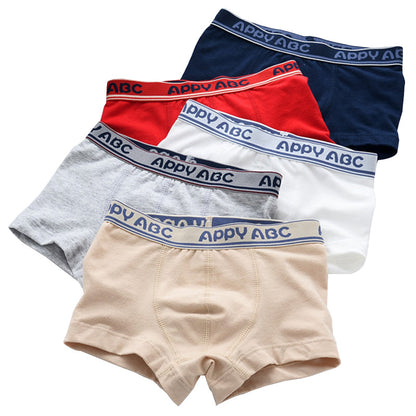 Children's five-pack boxer underwear by ETX, shown in assorted colors and patterns