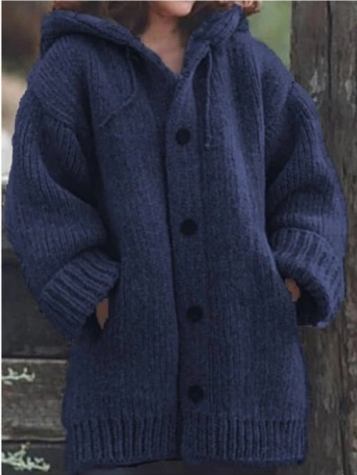Warm sweater coat with a cozy knit texture and long, comfortable fit