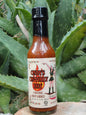Cinderosa Ranch Cindy's Cin-fully Hot Cayenne Hot Sauce bottle with bright label and vibrant red hot sauce inside