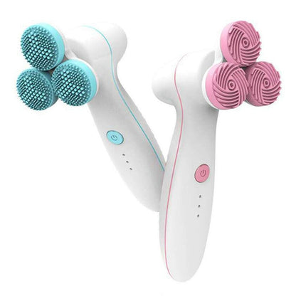 Three round 3D silicone cleansing instruments in assorted colors